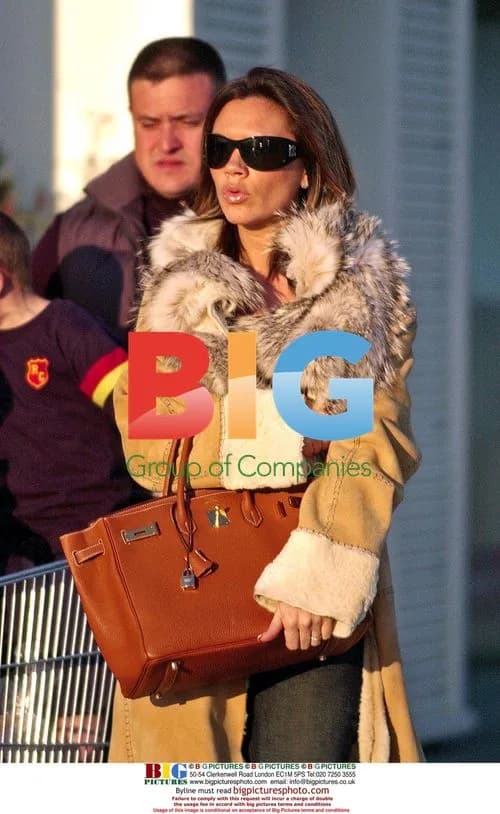 Victoria Beckham and Sons Go Shopping in Madrid