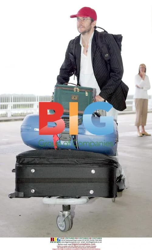 Joe Pasquale Arrives at Brisbane Airport