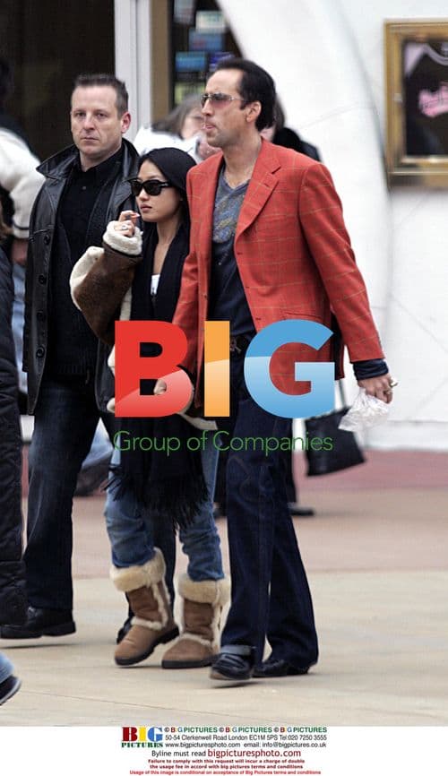 Nicolas Cage and wife Alice Kim in Disneyland Paris