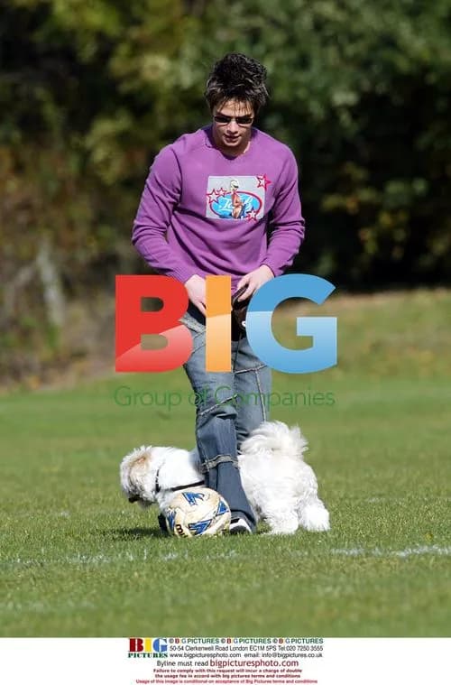 Danny Young with dog in park
