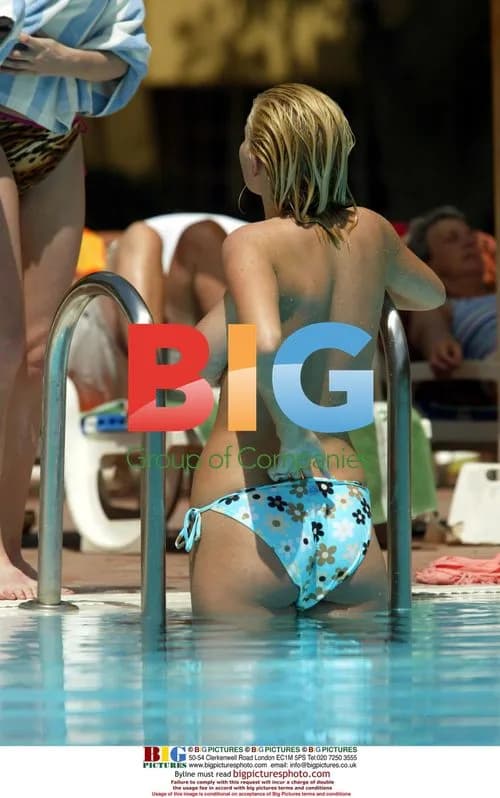 Glamour models Michelle Marsh and Jo Hicks poolside