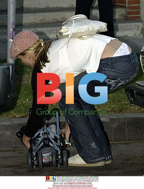 Natasha Henstridge Shopping with Son