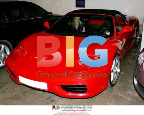 Model Jordan Tests Red Ferrari