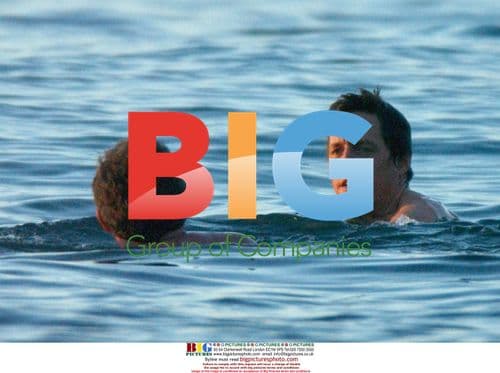 Hugh Grant Enjoys Caribbean Swim