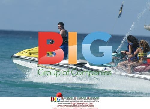 Simon Cowell and Terri Seymour jet skiing in Barbados