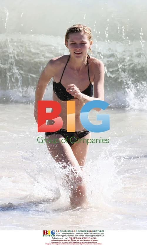 Kirsten Dunst Swims in the Ocean in St Barths