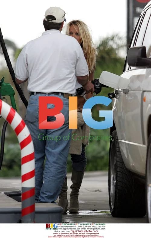 Pamela Anderson Struggles at Gas Pump