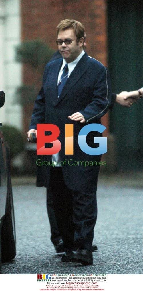 Elton John leaves T. Goode store in London