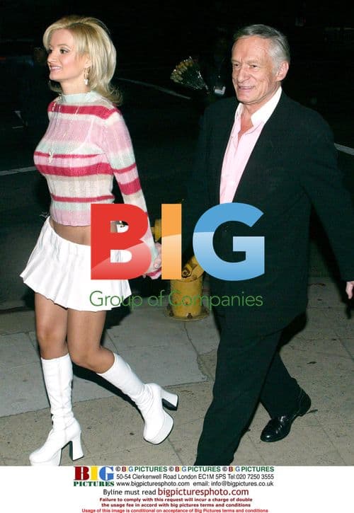 Hugh Hefner and Playmates at Hollywood Club