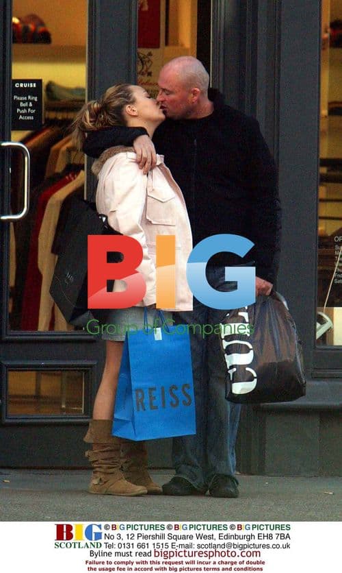 Actress Charlie Brookes shopping with boyfriend