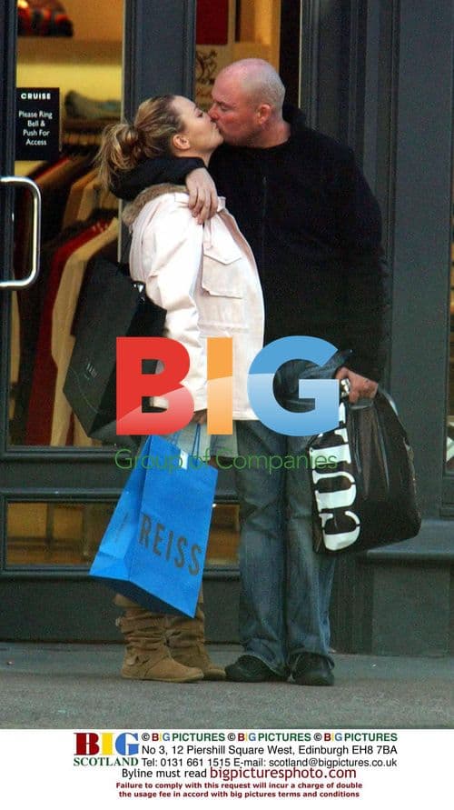 Actress Charlie Brookes shopping with boyfriend