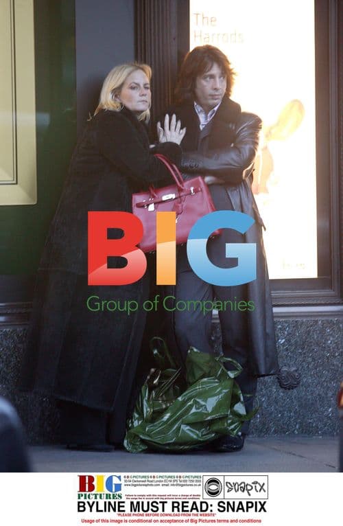 Laurence LLewelyn-Bowen and Wife Wait for Cab