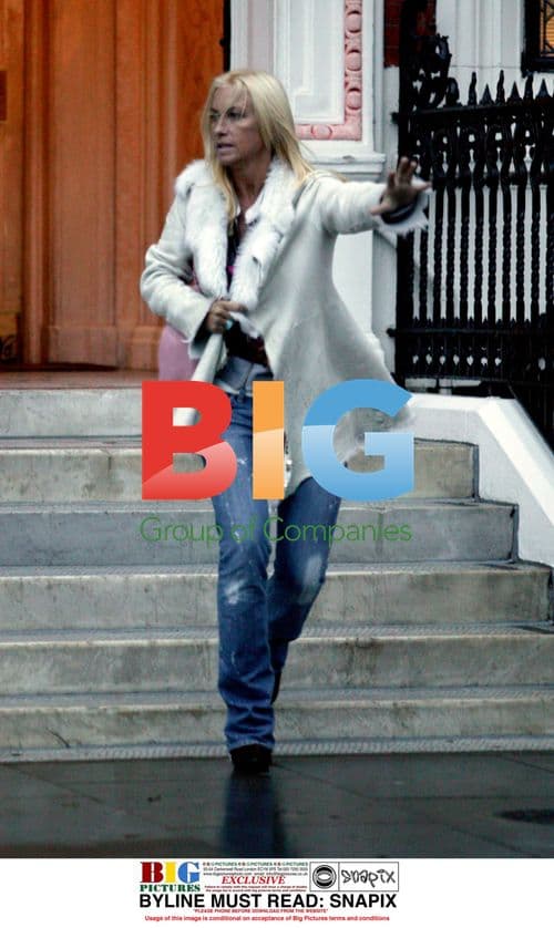 Meg Matthews Hails Cab in London