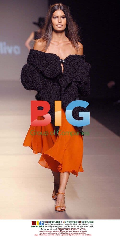 Model in Orange Look at Juanjo Oliva Show