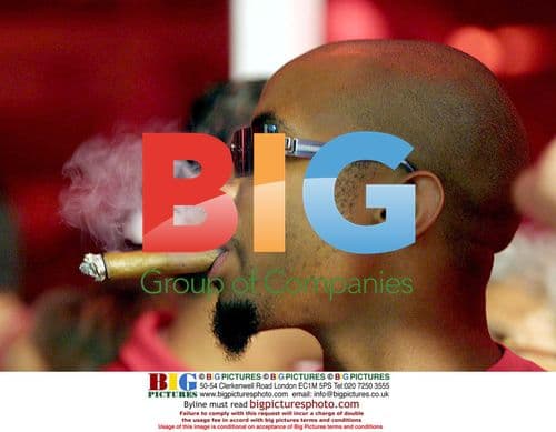 Mangala Mandela Smoking Cigar at Daniela Mercury's Balcony