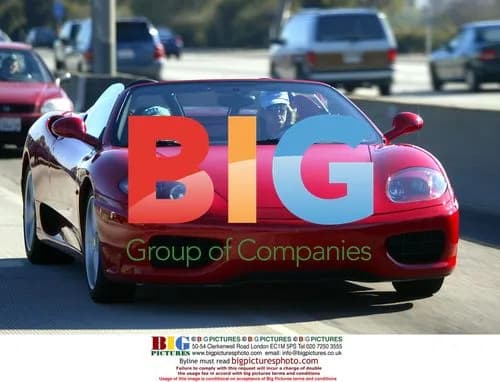 Rod Stewart and Penny Lancaster Ride in Ferrari