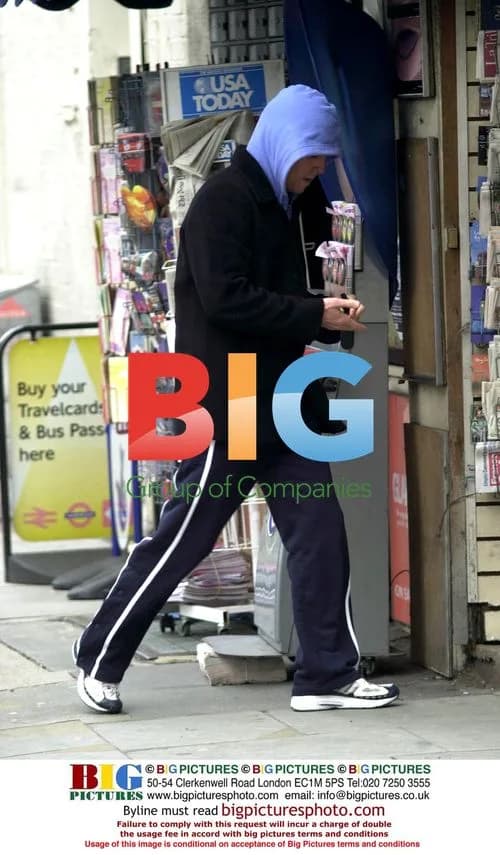Hugh Grant Gets Newspaper in London