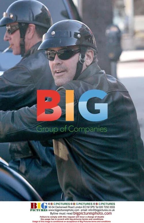 George Clooney Riding Bike