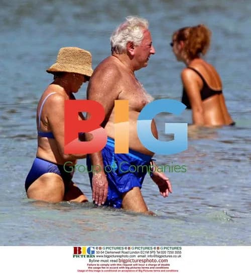 Michael Winner on Beach in Barbados
