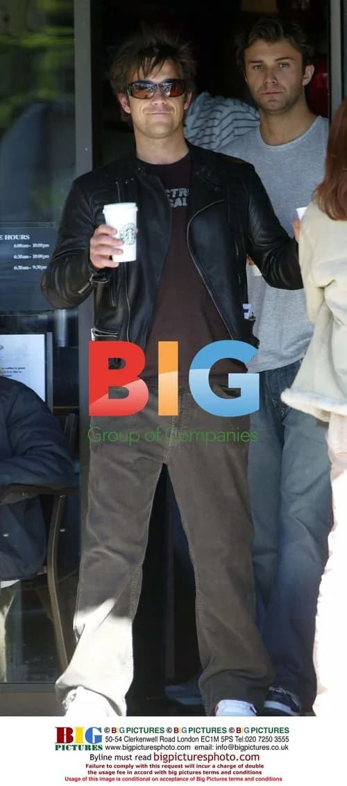 Singer Robbie Williams at Starbucks