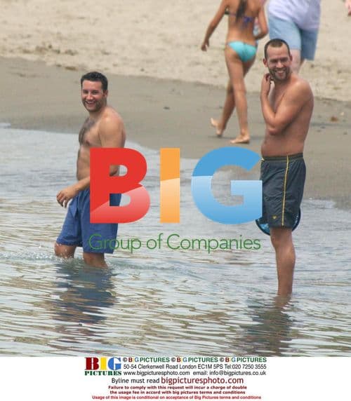 Dane Bowers playing in the sea in Marbella, Spain