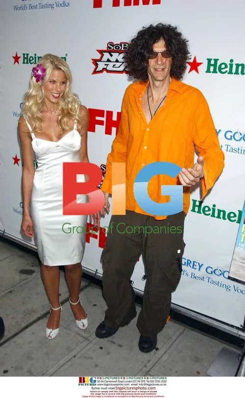 BETH OSTROSKY and HOWARD STERN at FHM Party
