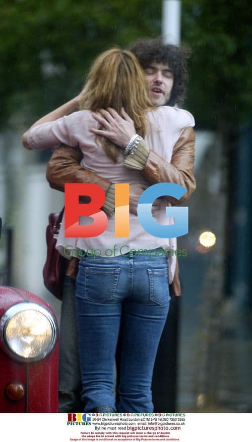 Elle McPherson Spotted with Mystery Man