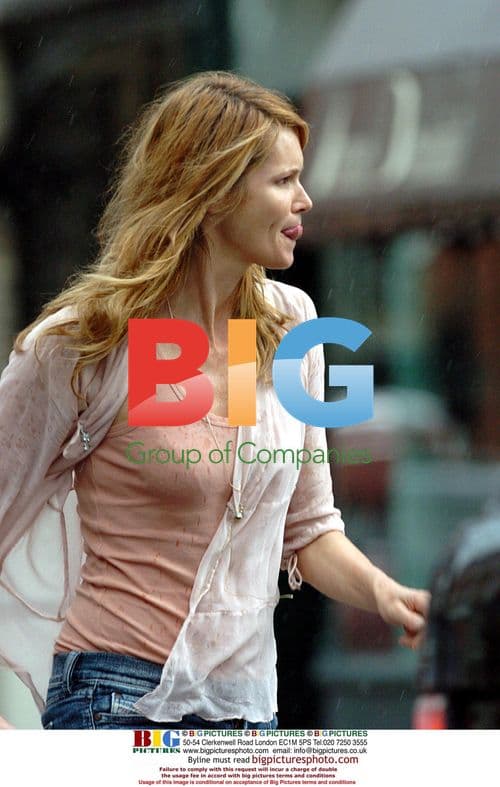 Elle McPherson and Mystery Man in Soho