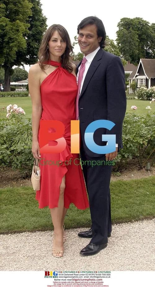 Liz Hurley and Arun Nayar at Dior show