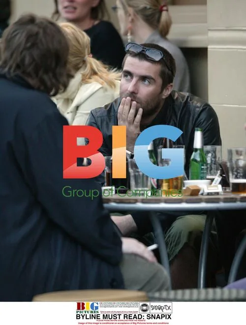 Liam Gallagher Shares Laugh with Brother
