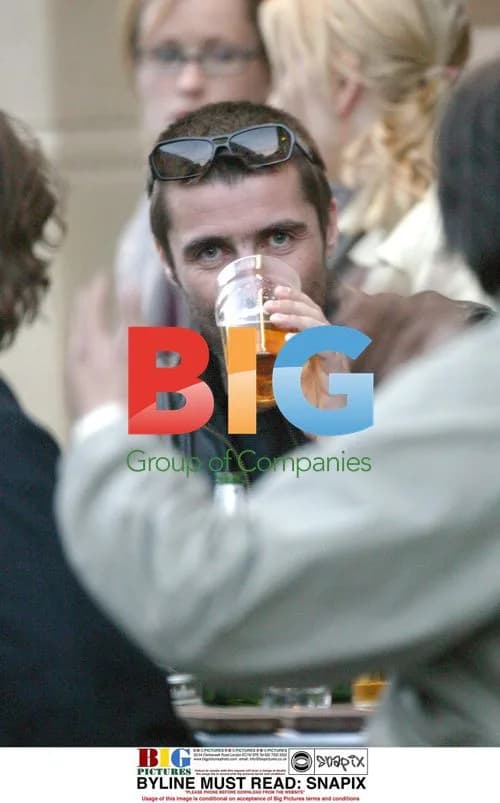 Liam Gallagher Laughs with Brother in London