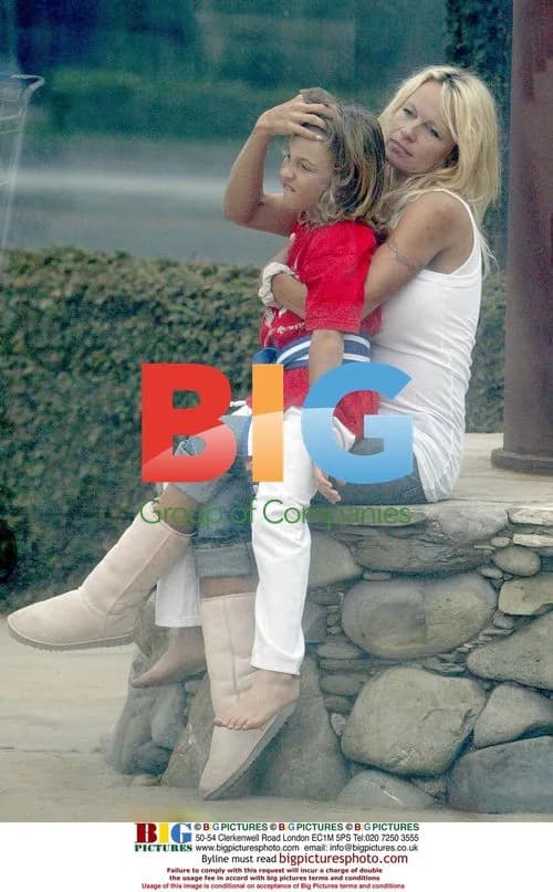 Pamela Anderson picks up sons from karate