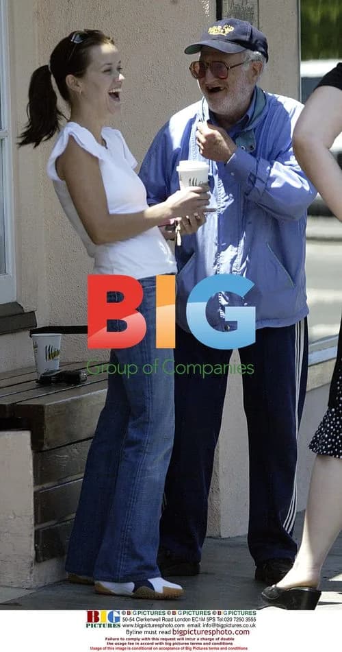 Reese Witherspoon Interacts with Man and Dog in Santa Monica