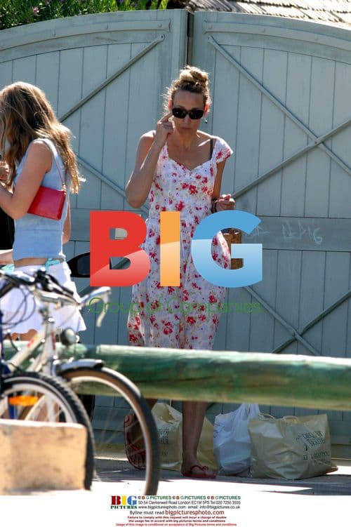 Jerry Hall with Kids Outside House