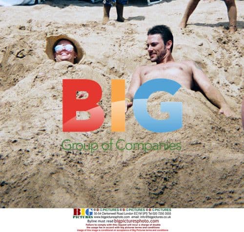 Britney Spears & Kevin Federline Buried in Sand
