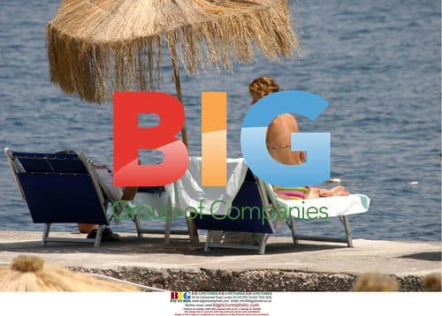 Eva Herzigova with Mick Davis on beach