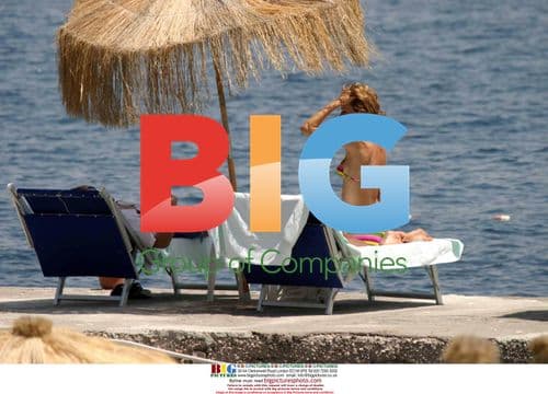 Eva Herzigova and Mick Davis on the Beach in Ischia