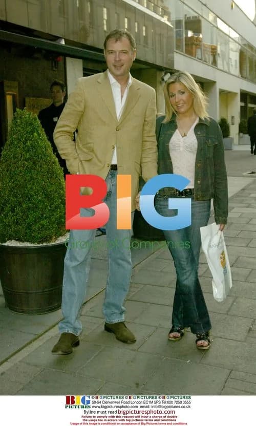 John Leslie and girlfriend at book launch