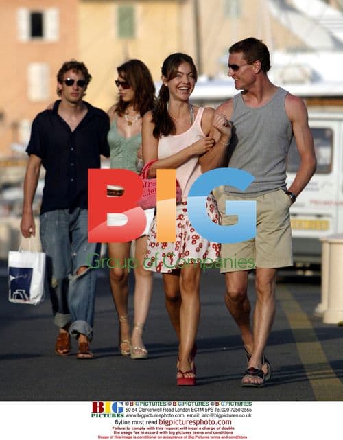 F1 Drivers Jenson Button and David Coulthard with Partners