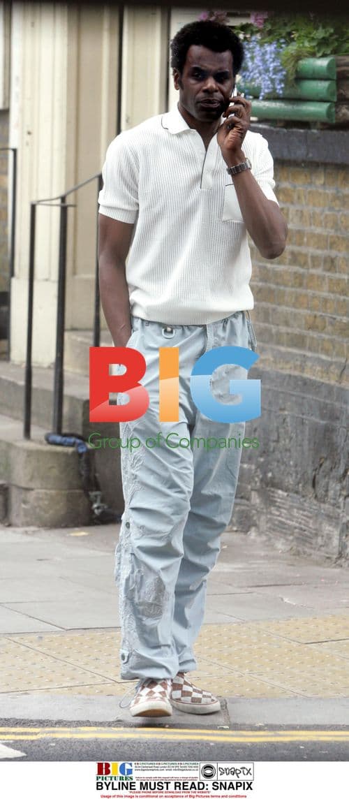 Normski Talking on Mobile in London