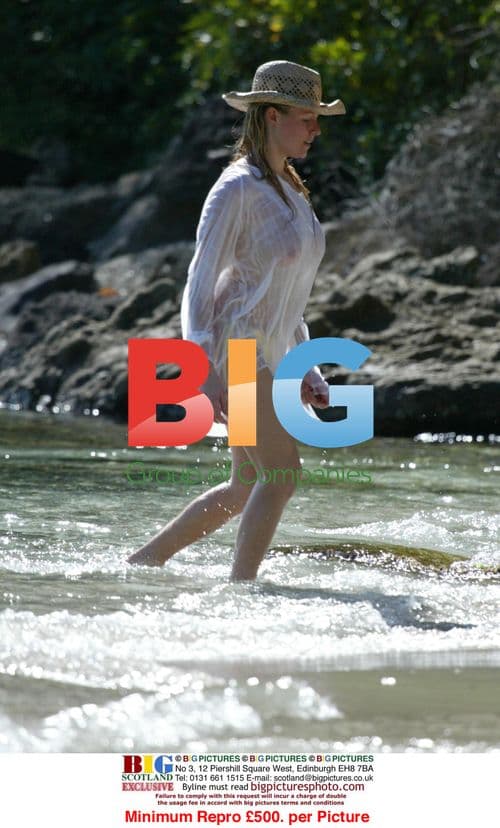 Abi Titmuss Practicing Yoga on Beach