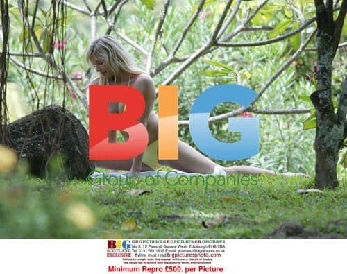 Abi Titmuss Practicing Yoga on Beach