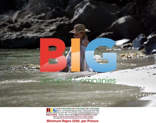 Abi Titmuss Practicing Yoga on Beach