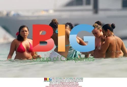Charlotte Church on beach holiday