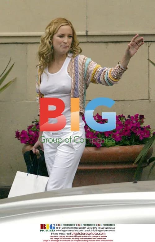 Kate Hudson in Revealing Top at Press Conference