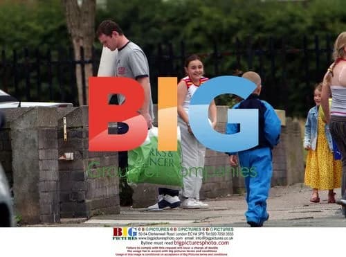 Wayne Rooney and Coleen McLoughlin return home after shopping