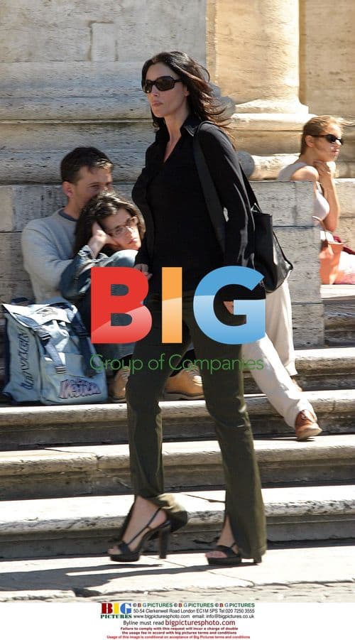 Monica Bellucci Leaves Hotel, Joins Husband for Lunch