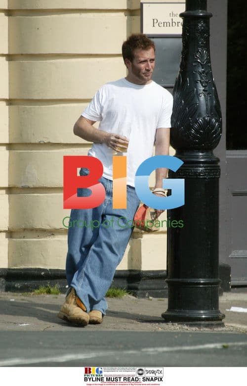 Jason Brown with Drink and Bag