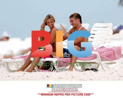 Jodie Marsh and boyfriend topless on beach