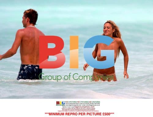 Jodie Marsh and boyfriend topless beach romp